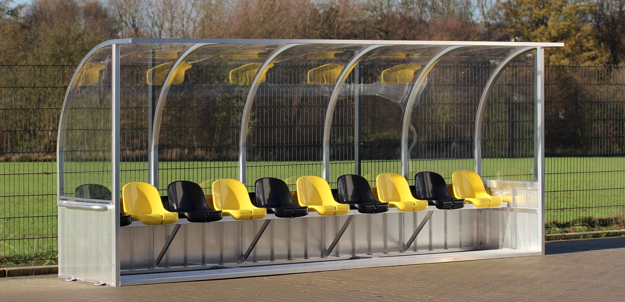Team shelter with seating shells for stadium and sports ground